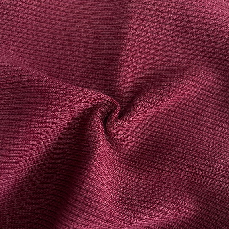 58 % Baumwolle, 38 % Poly-45-Spandex-Rippe, weicher Griff